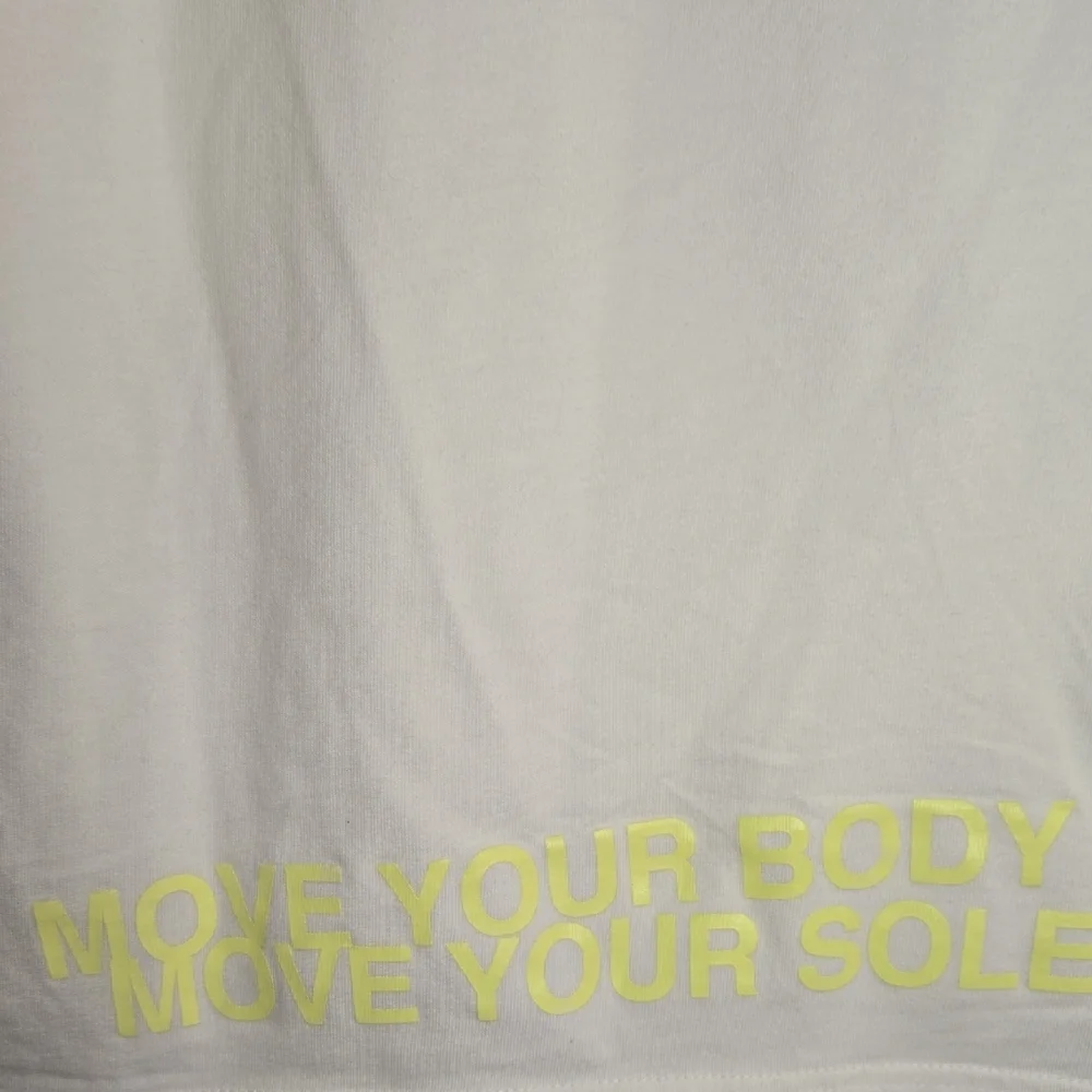 Nike World Tour White T-Shirt with Blue and Orange‎ Graphics